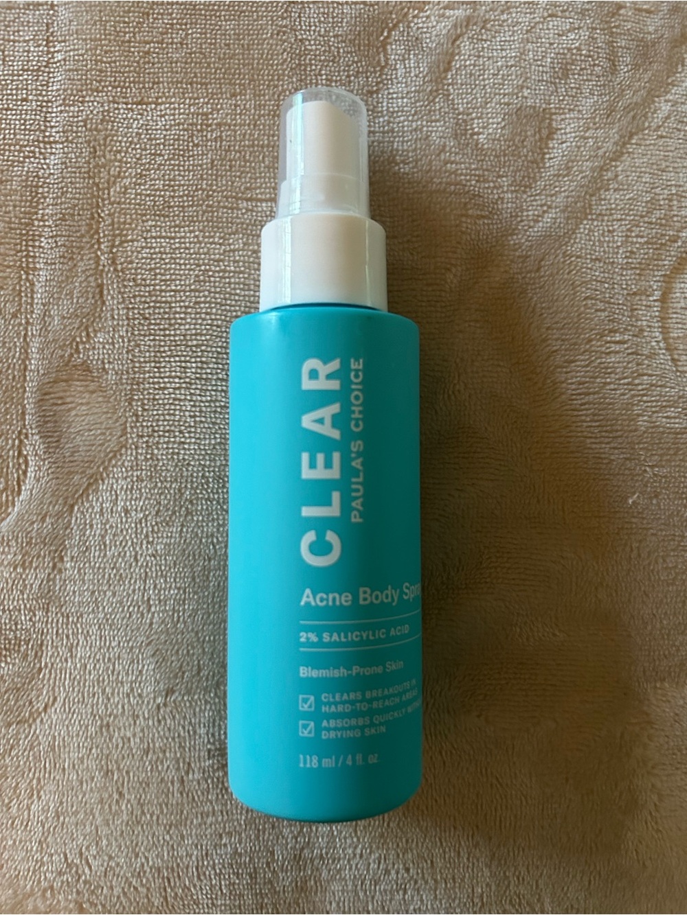 Paula's Choice CLEAR Acne Body Spray in Turquoise Blue Bottle